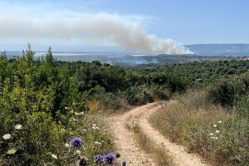 Smoke rises above the Israeli side of the Israel-Lebanon border following attacks from Lebanon, amid cross-border hostilities between Hezbollah and Israeli forces