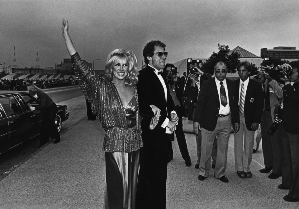 <p>The stars of <em>Three's Company</em> arrive in style at the Emmy ceremony in Pasadena, California. The show eventually landed star John Ritter with an Emmy in 1984.</p>