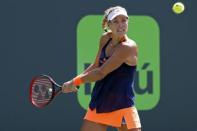 Mar 26, 2017; Miami, FL, USA; Angelique Kerber of Germany hits a backhand against Shelby Rogers of the United States (not pictured) on day six of the 2017 Miami Open at Crandon Park Tennis Center. Kerber won 6-4, 7-5. Mandatory Credit: Geoff Burke-USA TODAY Sports