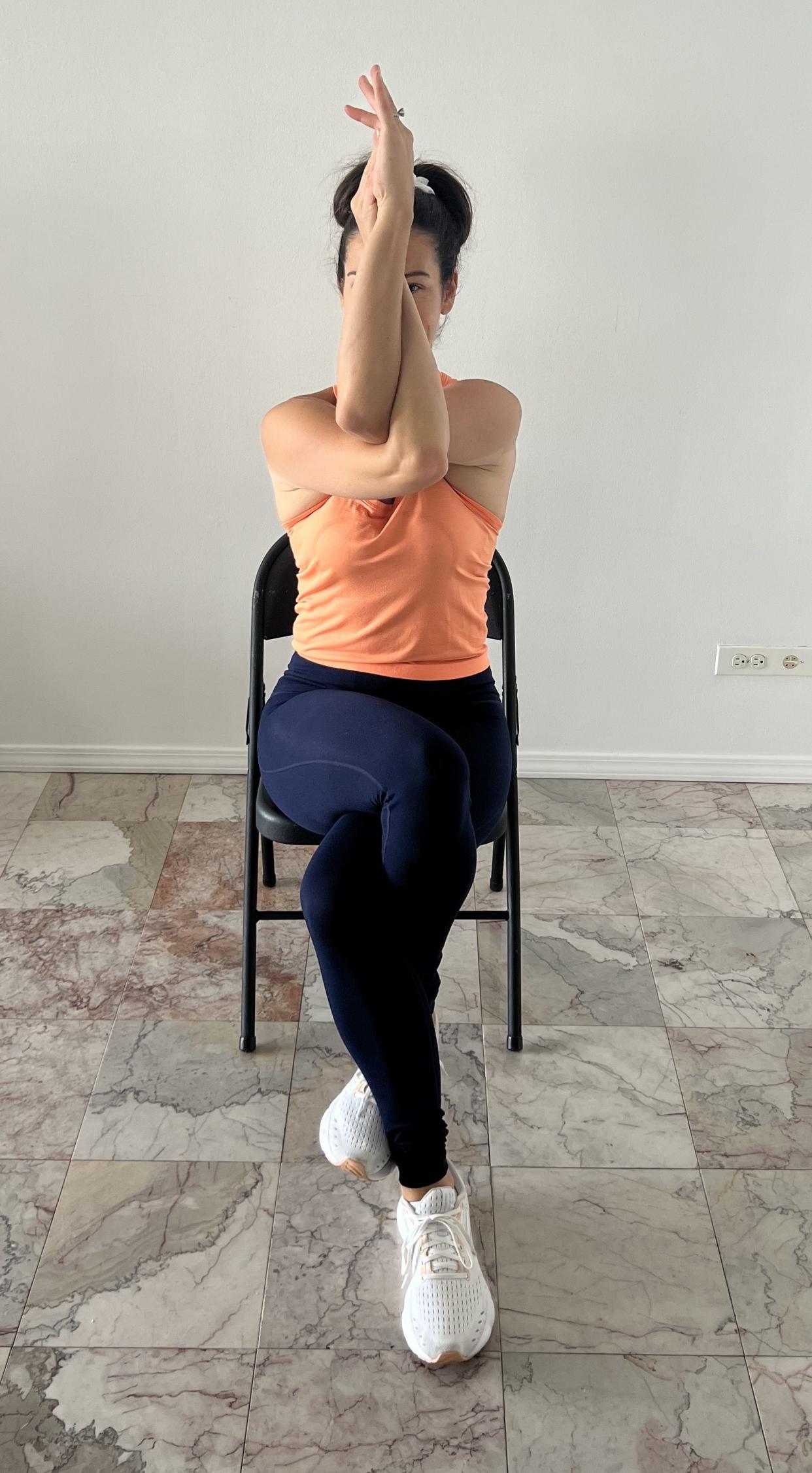 Eagle chair yoga pose