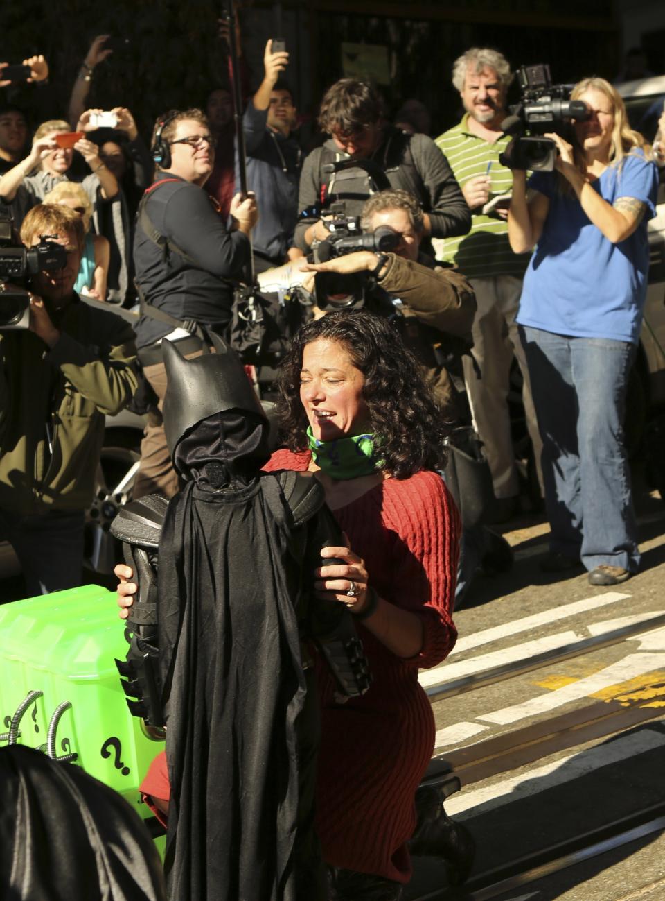 Leukemia survivor Miles enjoys a day as "Batkid", arranged by the Make-A-Wish Foundation, in San Francisco