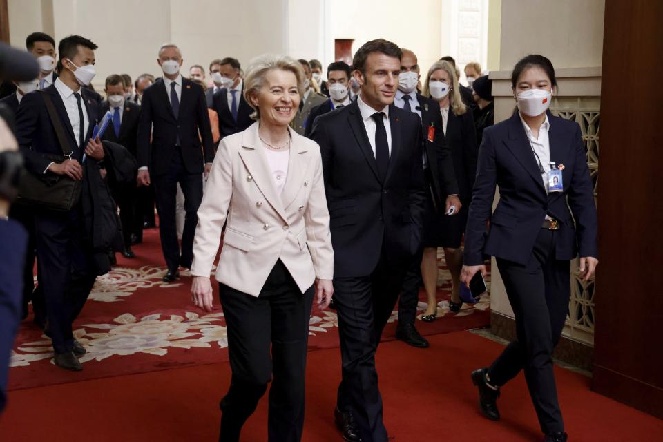 FILE - French President Emmanuel Macron and European Commission President Ursula von de Leyen, center left, arrive for a working session with Chinese President Xi Jinping in Beijing, on April 6, 2023. In the weeks since Chinese leader Xi Jinping won a third five-year term as president, setting him on course to remain in power for life, leaders and diplomats from around the world have beaten a path to his door. None more so than those from Europe. (Ludovic Marin/Pool via AP, File)