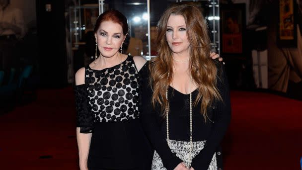 PHOTO: Priscilla Presley and Lisa Marie Presley attend the ribbon-cutting ceremony during the grand opening of 'Graceland Presents ELVIS: The Exhibition - The Show - The Experience' at the Westgate Las Vegas Resort & Casino, April 23, 2015, in Las Vegas. (Bryan Steffy/WireImage/Getty Images)