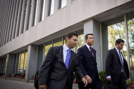 U.S. Representative Michael Grimm (R-NY) (C), arrives at the Brooklyn Federal Courthouse in the Brooklyn Borough of New York September 2, 2014. REUTERS/Brendan McDermid