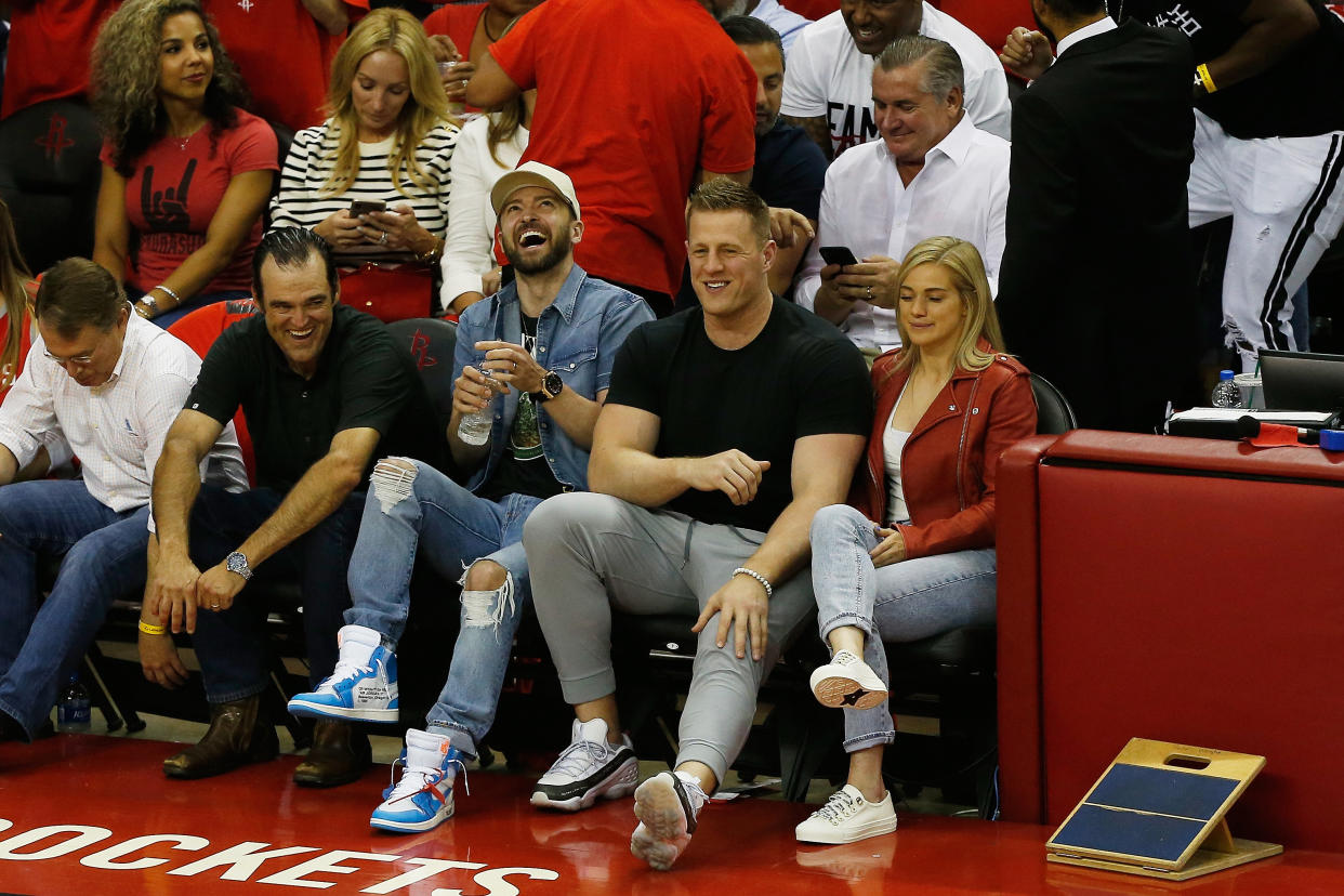 Justin Timberlake and J.J. Watt sat courtside together to watch the Houston Rockets host the Golden State Warriors in Game 5 of the Eastern Conference Finals. (Getty Images)