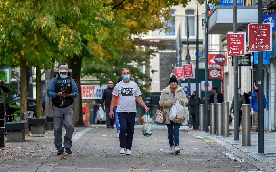 Shoppers in Newport - ben birchall/pa