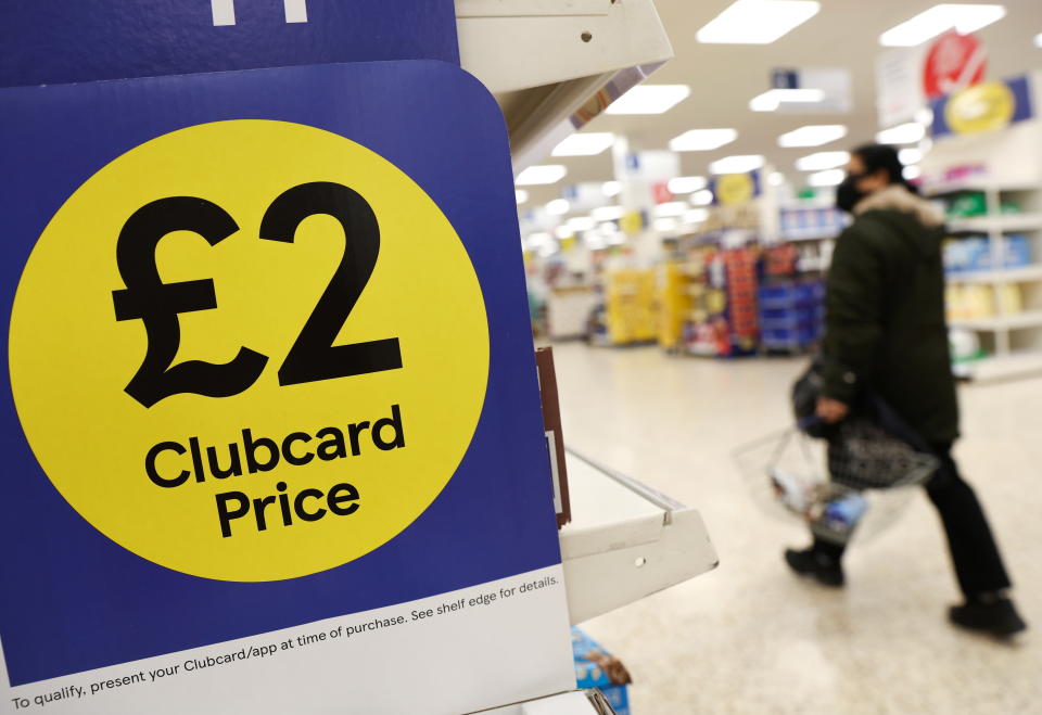 Clubcard branding is seen inside a branch of a Tesco Extra Supermarket in London, Britain, February 10, 2022. Picture taken February 10, 2022. REUTERS/Paul Childs