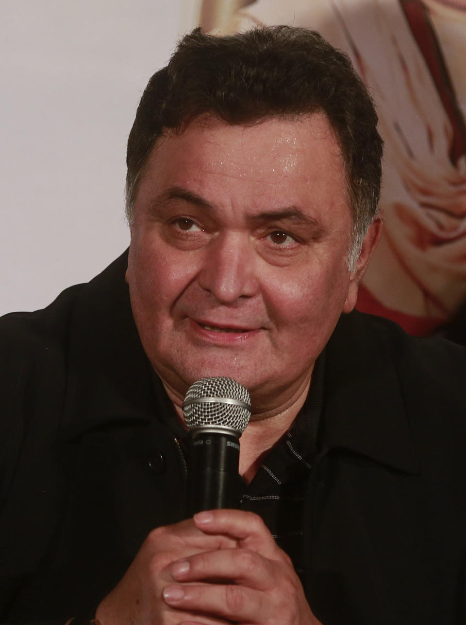 FILE- In this July 1, 2015 file photo, Bollywood actor Rishi Kapoor speaks during the trailer launch of his upcoming movie "All is Well" in Mumbai, India. Rishi Kapoor, a top Indian actor and a scion of Bollywood’s most famous Kapoor family, has died after a battle with cancer. He was 67. (AP Photo/Rafiq Maqbool, File)