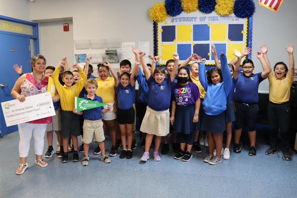 Teachers and students celebrate receiving a classroom grant from Champions for Learning in Collier County.