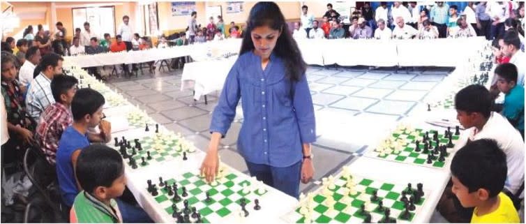 <span class="caption">Rucha Pujari playing simultaneous chess in Kolhapur, India.</span> <span class="attribution"><span class="source">AkshayP013/wikimedia</span>, <a class="link " href="http://creativecommons.org/licenses/by-sa/4.0/" rel="nofollow noopener" target="_blank" data-ylk="slk:CC BY-SA;elm:context_link;itc:0;sec:content-canvas">CC BY-SA</a></span>