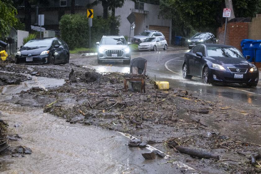 Los Angeles, CA - February 05: Mud and debris are seen along Beverly Glen Blvd during a rainstorm at Hollywood Hills on Monday, Feb. 5, 2024 in Los Angeles, CA. (Ringo Chiu / For The Times)