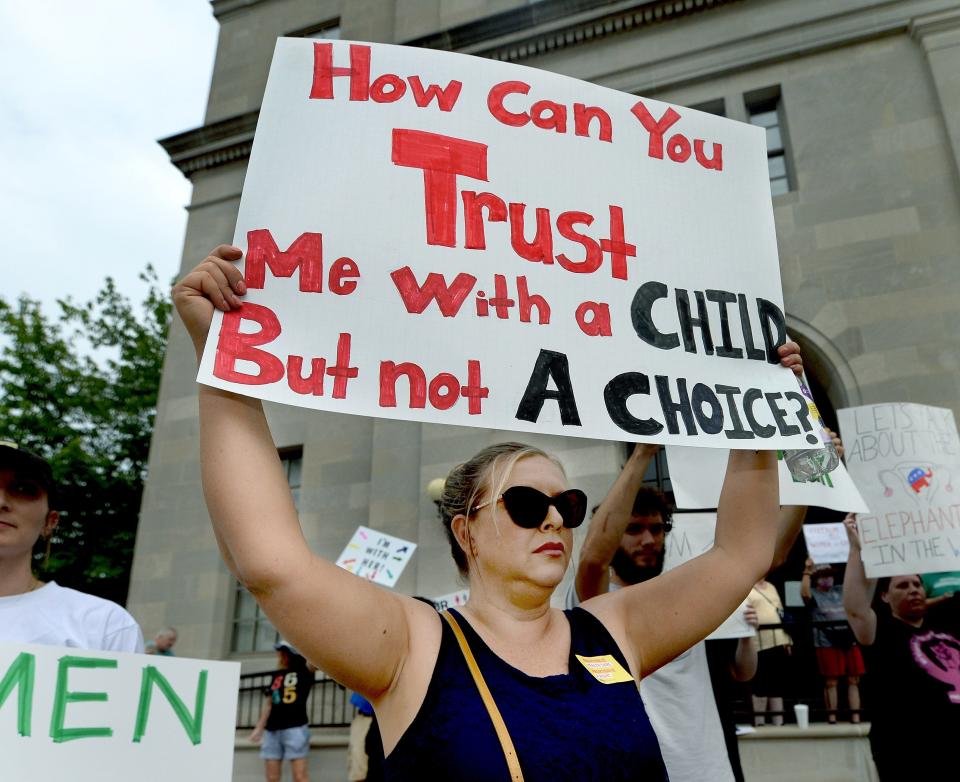 Jodie Williams of Springfield attends a Abortion-rights protest rally in front of the Springfield Federal Courthouse Friday June 24, 2022 held by "The Resistor Sisterhood" as a reaction to the overturning of Roe by the U.S. Supreme Court.