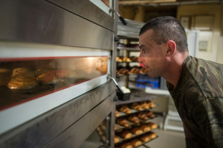 Jerome Aucant, who used to be homeless in Dole, southern France, now works at Michel Flamant's bakery