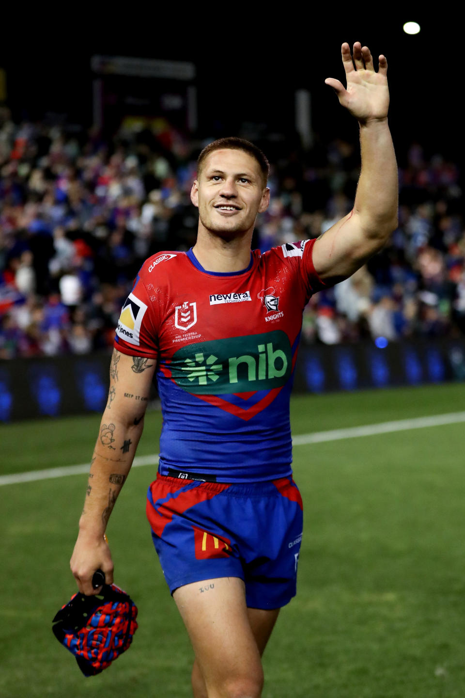 Kalyn Ponga waves to the crowd.