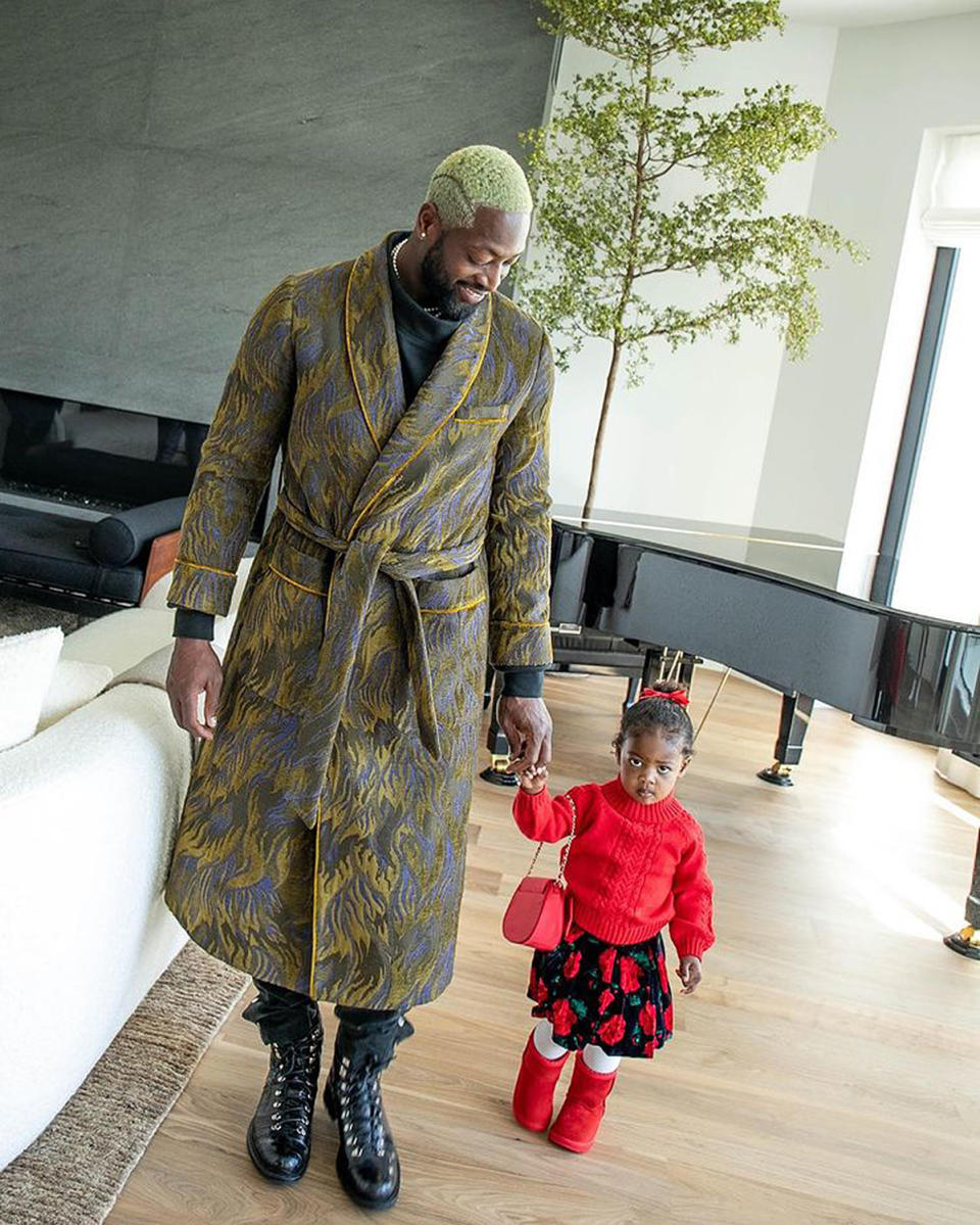 <p>The retired NBA star and his daughter Kaavia, 2, rocked some chic outfits while <a href="https://www.instagram.com/p/CIOYvLRncys/" rel="nofollow noopener" target="_blank" data-ylk="slk:strutting their stuff;elm:context_link;itc:0;sec:content-canvas" class="link ">strutting their stuff</a> through the living room. </p>