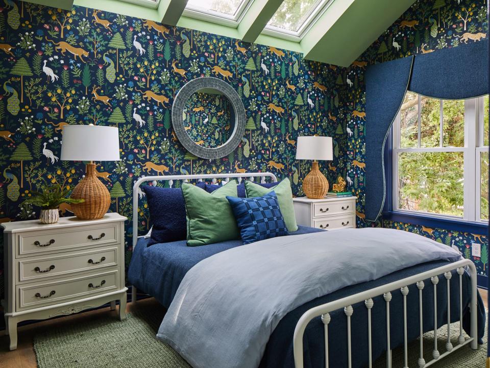 Built by Louisville’s Twin Spires Remodeling and decked out by HGTV interior designer Brian Patrick Flynn, the house is part of the HGTV Urban Oasis 2023 sweepstakes. Pictured here is the green guest bedroom.