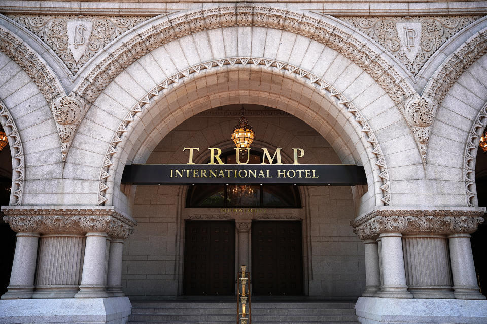 The Trump International Hotel, located&nbsp;blocks from the White House, has become both a tourist attraction in the nation's capital and also a symbol of President Trump's intermingling of business and politics. (Photo: Win McNamee via Getty Images)