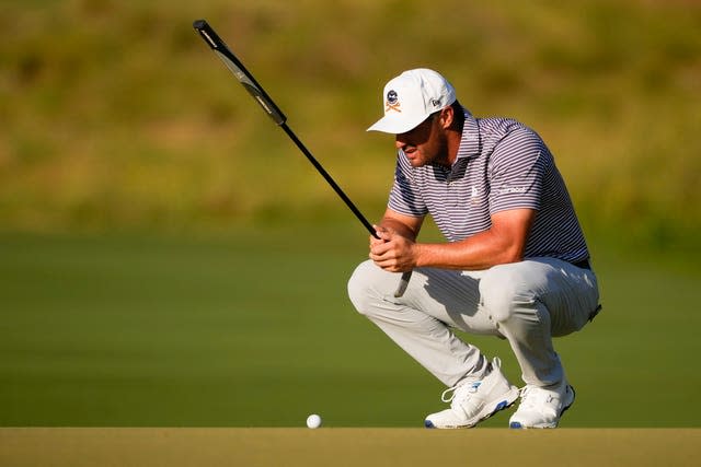 Bryson DeChambeau lines up a putt in the US Open at Pinehurst