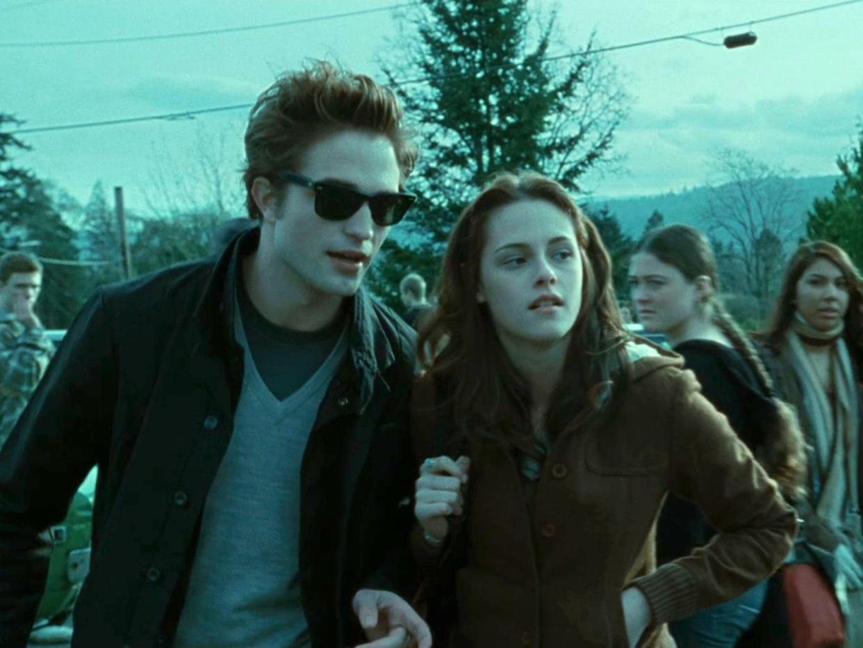 Robert Pattinson as Edward Cullen and Kristen Stewart as Bella Swan in "Twilight."