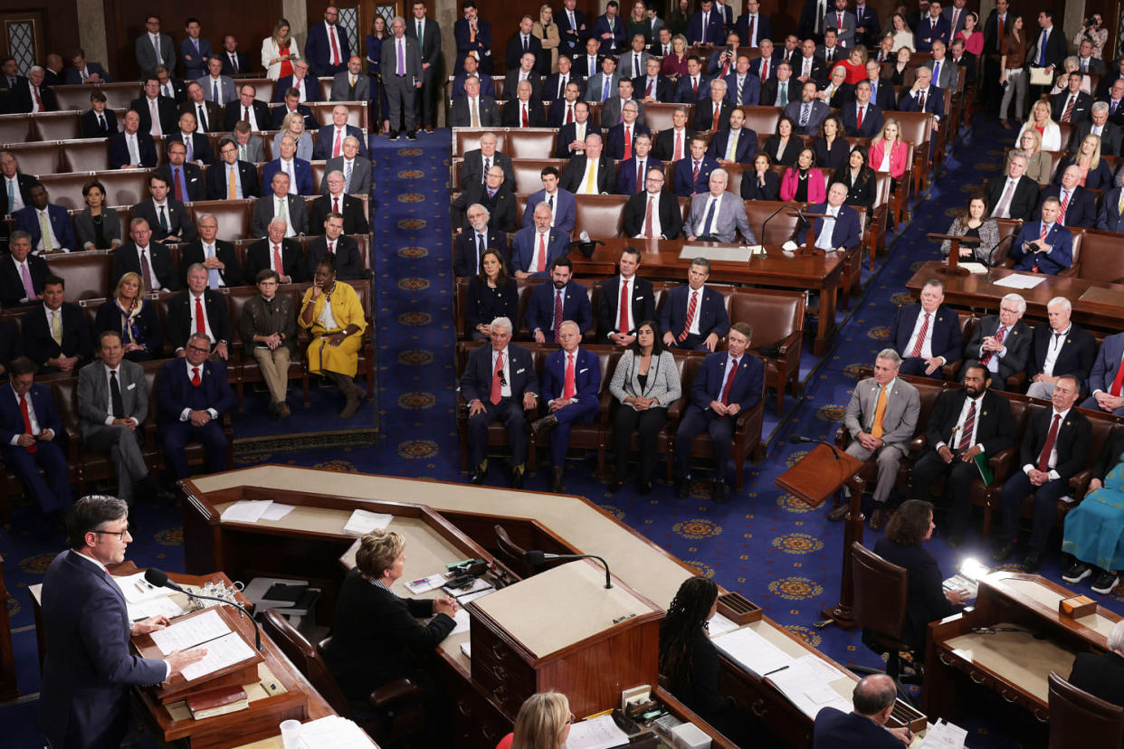 Rep. Mike Johnson speaks to 
 congress members in the House auditorium (Alex Wong / Getty Images)