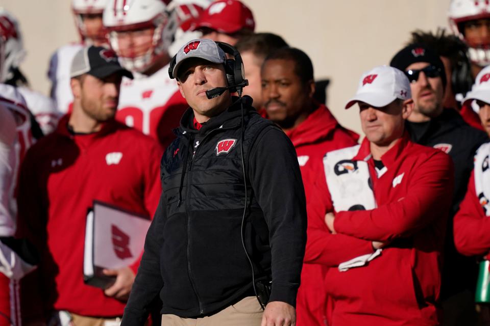 Wisconsin interim head coach Jim Leonhard watches from the sideline during the first half against Michigan State, Saturday, Oct. 15, 2022, in East Lansing, Mich.