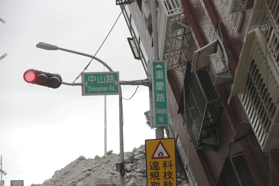 A building is seen partially collapsed, two days after a powerful earthquake struck the city, in Hualien City, eastern Taiwan, Friday, April 5, 2024. Rescuers searched Thursday for missing people and worked to reach hundreds stranded when Taiwan's strongest earthquake in 25 years sent boulders and mud tumbling down mountainsides, blocking roads. (AP Photo/Chiang Ying-ying)