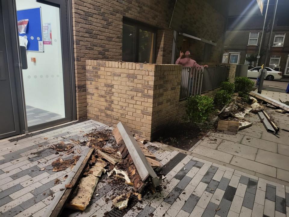 Pieces of metal and rotted wood were seen in pieces outside the apartment complex entrance (Kinga Surowka)