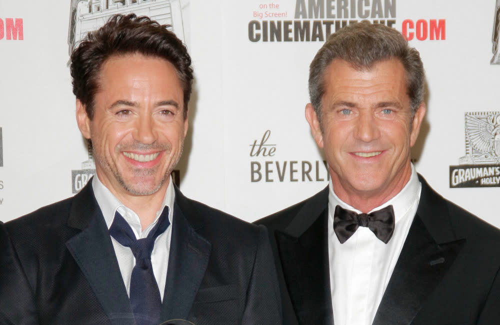 Robert Downey Jr and Mel Gibson in 2011 credit:Bang Showbiz