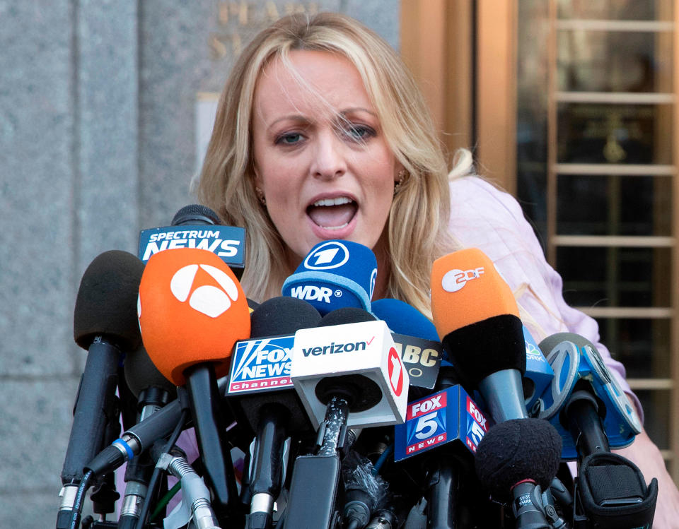 Stormy Daniels speaks to reporters outside the federal court in New York after she filed a defamation complaint against the President. (AP Photo/Mary Altaffer)