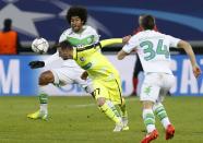 Football Soccer - KAA Gent v VfL Wolfsburg - UEFA Champions League Round of 16 First Leg - Ghelamco Arena, Ghent, Belgium - 17/2/2016 KAA Gent's Danijel Milicevic in action against VfL Wolfsburg's Dante (L) and Ricardo Rodriguez (R). REUTERS/Francois Lenoir