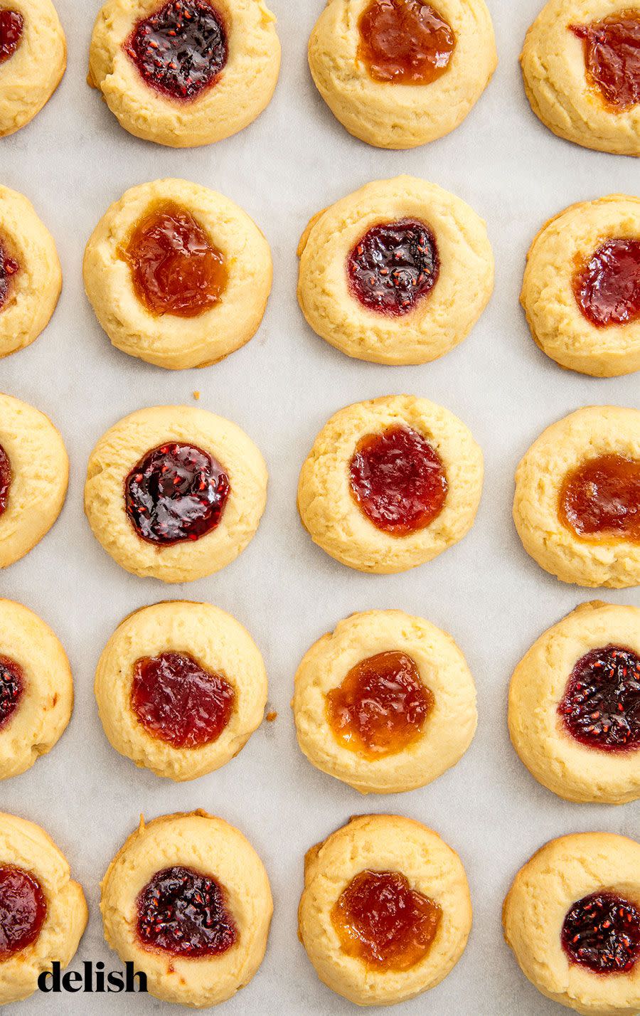 <p>Jam thumbprints are one of the most classic Christmas cookies (and we hear they're one of Santa's favorites. 😉). With a buttery <a href="https://www.delish.com/cooking/recipe-ideas/a24687595/shortbread-cookie-recipe/" rel="nofollow noopener" target="_blank" data-ylk="slk:shortbread;elm:context_link;itc:0;sec:content-canvas" class="link ">shortbread</a> base and warm <a href="https://www.delish.com/cooking/g2137/jam-recipes/" rel="nofollow noopener" target="_blank" data-ylk="slk:jam;elm:context_link;itc:0;sec:content-canvas" class="link ">jam</a> center, they're the ultimate indulgence. They're truly a treat fit for the jolly sleigh-rider in all of us.</p><p>Get the <strong><a href="https://www.delish.com/cooking/recipe-ideas/recipes/a56358/easy-jam-thumbprint-cookies/" rel="nofollow noopener" target="_blank" data-ylk="slk:Jam Thumbprints recipe;elm:context_link;itc:0;sec:content-canvas" class="link ">Jam Thumbprints recipe</a></strong>.</p>