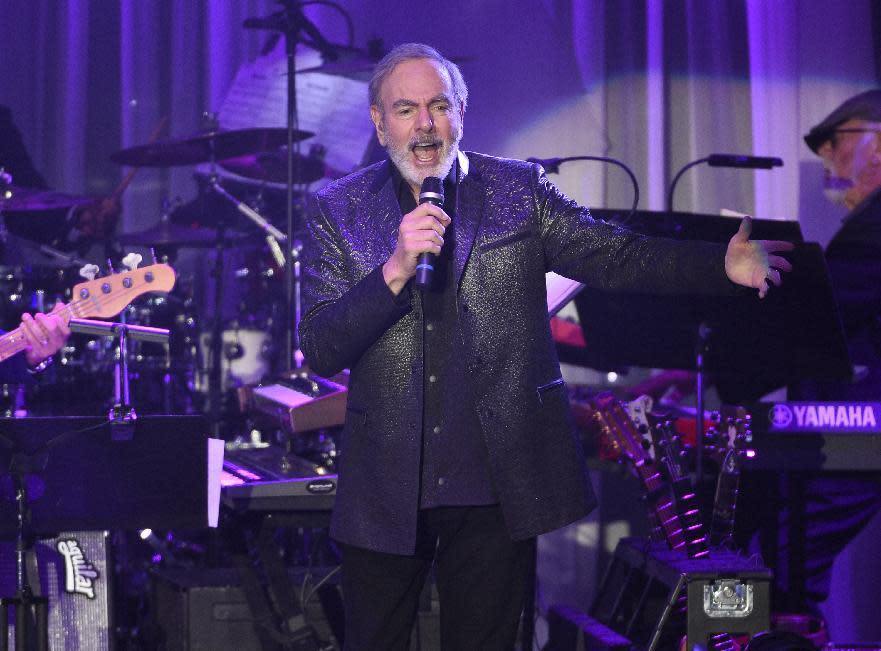 Neil Diamond performs at the Clive Davis and The Recording Academy Pre-Grammy Gala at the Beverly Hilton Hotel on Saturday, Feb. 11, 2017, in Beverly Hills, Calif. (Photo by Chris Pizzello/Invision/AP)