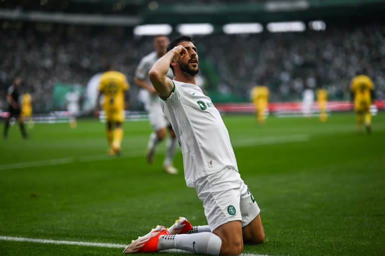 Sporting's Portuguese forward Paulinho celebrates scoring on Saturday with his team's title success wrapped up on Sunday as Benfica lost (PATRICIA DE MELO MOREIRA)