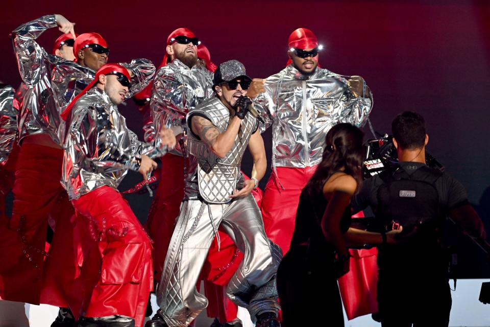 Yandel performs.