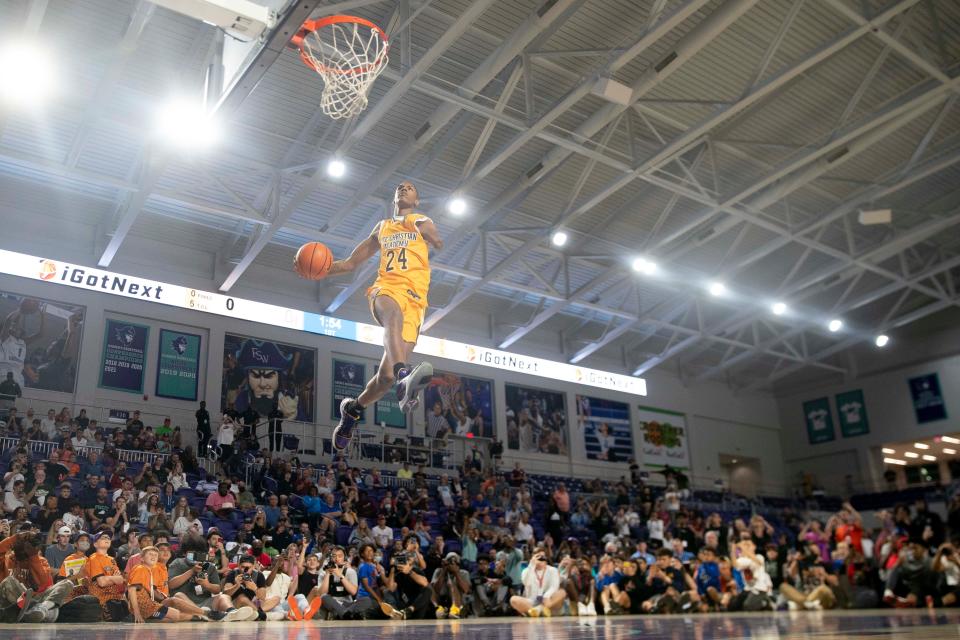 Life Christian's Hansel Enmanuel Donato (24) dunks the ball during the 2021 City of Palms Classic Edison Bank SLAM DUNK Contest, Sunday, Dec. 19, 2021, at Suncoast Credit Union Arena in Fort Myers, Fla.Life Christian's Hansel Enmanuel Donato (24) won the slam dunk contest.
