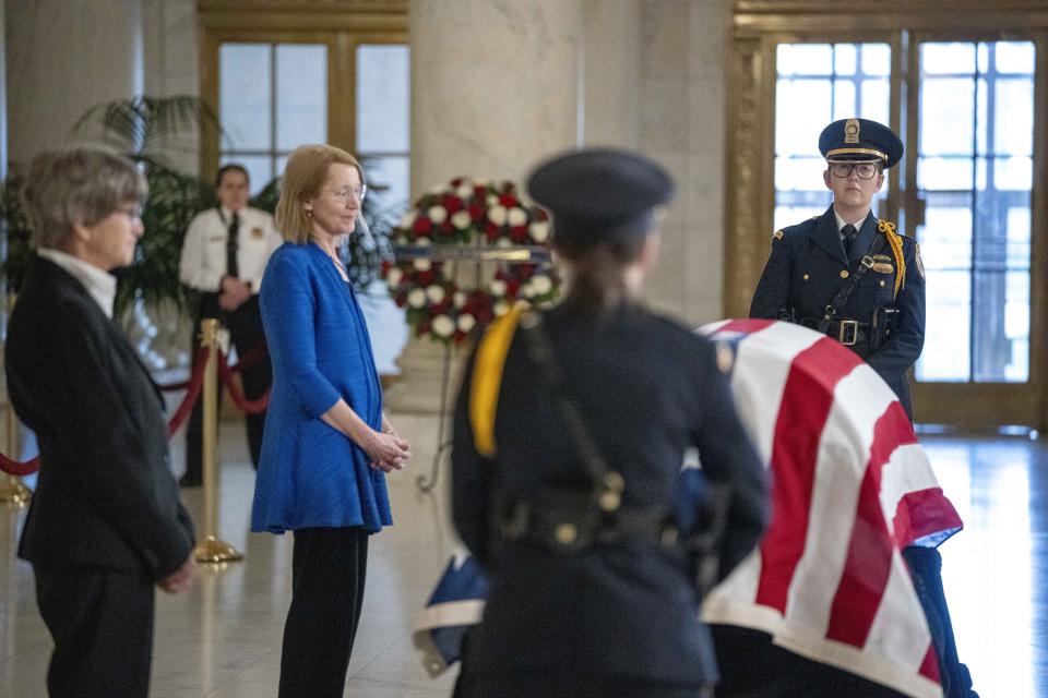 Former law clerks for retired Supreme Court Justice Sandra Day O'Connor stand at the casket during public repose in the Great Hall at the Supreme Court in Washington, Monday, Dec. 18, 2023. O'Connor, a Arizona native and the first woman to serve on the nation's highest court, died Dec. 1 at age 93. (AP Photo/Alex Brandon)