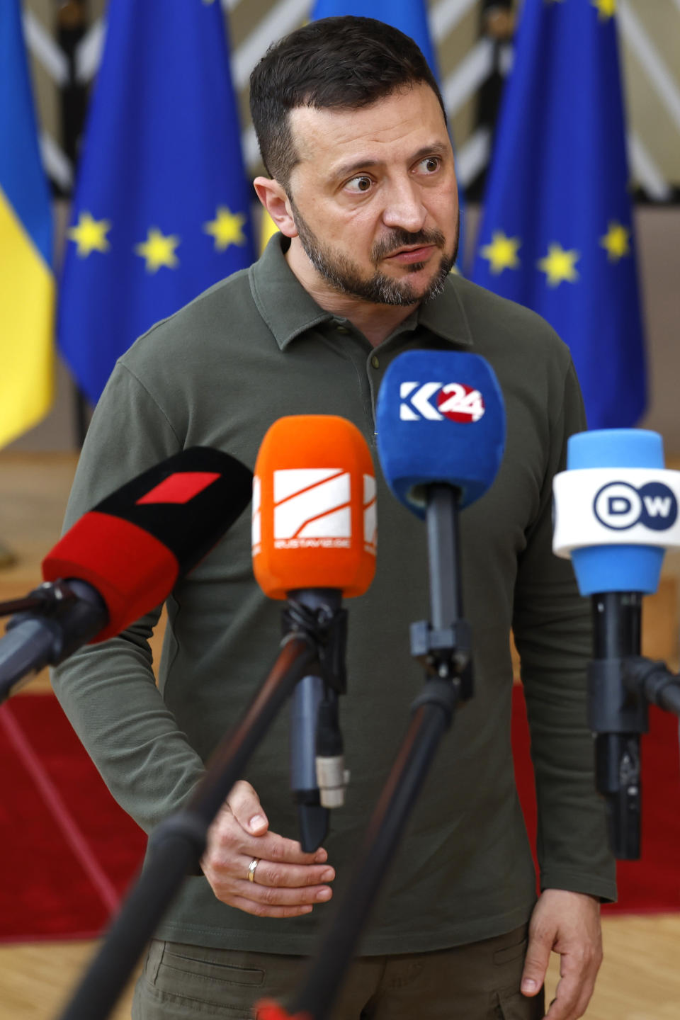 Ukraine's President Volodymyr Zelenskyy speaks with the media as he arrives for an EU summit in Brussels, Thursday, June 27, 2024. European Union leaders are expected on Thursday to discuss the next EU top jobs, as well as the situation in the Middle East and Ukraine, security and defence and EU competitiveness. (AP Photo/Geert Vanden Wijngaert)