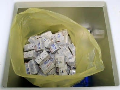 FILE PHOTO: Boxes of anti-dengue vaccine Dengvaxia are placed inside a freezer for storage at the Manila Health Department in Sta Cruz, metro Manila, Philippines December 5, 2017.  REUTERS/Romeo Ranoco