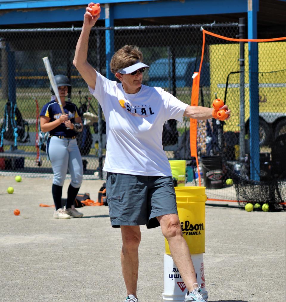 Whiteford assistant coach and former head coach Kris Hubbard throws pitches during warm ups before the Division 4 state quarterfinals against Bridgman on Tuesday, June 15, 2021 at Bailey Park in Battle Creek.