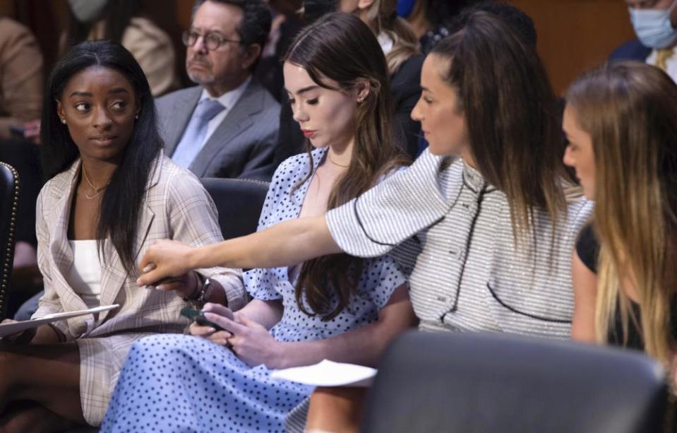 United States gymnasts from left, Simone Biles, McKayla Maroney, Aly Raisman and Maggie Nichols, arrive to testify during a Senate hearing about the Inspector General's report on the FBI's handling of the Larry Nassar investigation on Sept. 15, 2021.