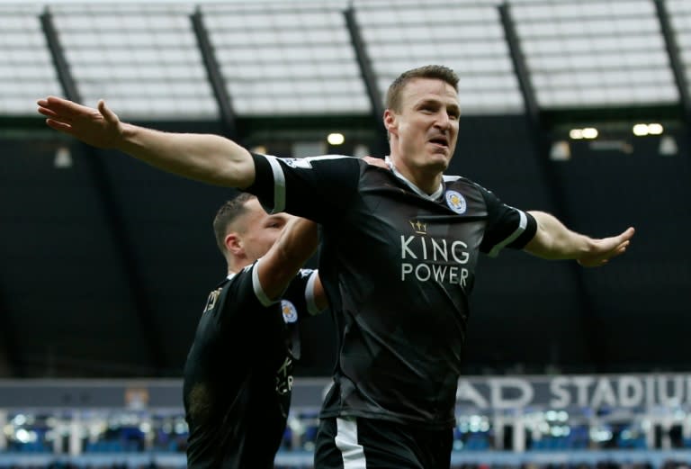 Leicester City's defender Robert Huth celebrates scoring his team's third goal during the English Premier League football match between Manchester City and Leicester City at the Etihad Stadium in Manchester, England, on February 6, 2016