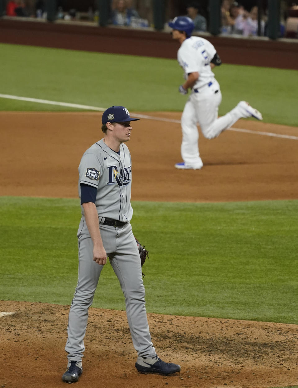 Los Angeles Dodgers' Corey Seager rounds the bases after a home run off Tampa Bay Rays relief pitcher Peter Fairbanks during the eighth inning in Game 2 of the baseball World Series Wednesday, Oct. 21, 2020, in Arlington, Texas. (AP Photo/Tony Gutierrez)