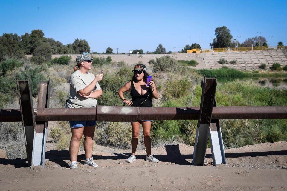 YUMA, Ariz. – Paloma Zuniga, right, a Mexican-born woman who now has dual U.S. citizenship, and two dozen members of AZ Patriots camp out along the Colorado River.