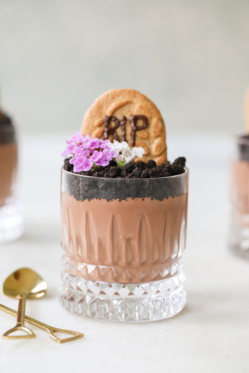 <p>Your desserts can double as decor, too. Make these Halloween dirt cups (aka chocolate pudding topped with Oreos, chocolate chips, Belvita cookies, and edible flowers) from <a href="https://sugarandcharm.com/dirt-cups" rel="nofollow noopener" target="_blank" data-ylk="slk:Sugar and Charm;elm:context_link;itc:0;sec:content-canvas" class="link ">Sugar and Charm</a>. </p><p><a class="link " href="https://www.amazon.com/gp/product/B07LBX8KLJ/?tag=syn-yahoo-20&ascsubtag=%5Bartid%7C10057.g.2554%5Bsrc%7Cyahoo-us" rel="nofollow noopener" target="_blank" data-ylk="slk:BUY NOW;elm:context_link;itc:0;sec:content-canvas">BUY NOW </a> <strong><em>Shovel Spoons, $12</em></strong></p>