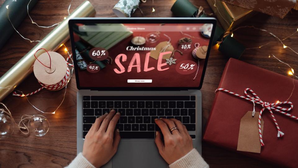 a person shops holiday sales online