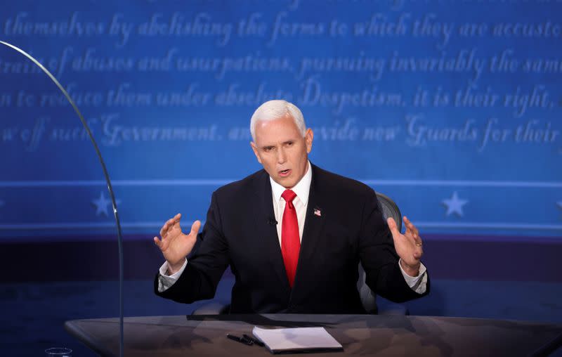 Democratic vice presidential nominee Senator Kamala Harris and U.S. Vice President Mike Pence participate in their 2020 vice presidential campaign debate in Salt Lake City