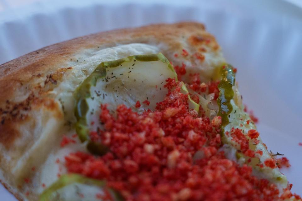 Enzo's Pizzeria's Hot Cheeto pickle pizza, sold at the Arizona State Fair on Sept. 22, 2023, in Phoenix.