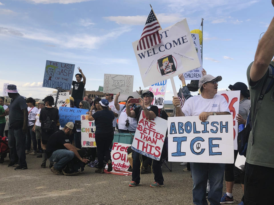 Several dozen protesters gather outside the Santa Ana Star Center arena ahead of President Donald Trump's rally in Rio Rancho, N.M., Monday, Sept. 16, 2019. Officials with Trump's campaign said they are working to win the support of more voters in the traditionally Democratic state ahead of the 2020 election. (AP Photo/Russell Contreras)