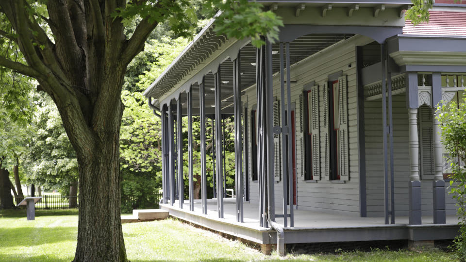 The front porch of the James A. Garfield National Historic site is shown, Wednesday, June 3, 2020, in Mentor, Ohio. Once upon a time, all U.S. presidential candidates were stuck at home. Infectious diseases, like the one preventing traditional campaigning so far this year by Donald Trump and Joe Biden, were only one reason. In the nation's early decades, campaigning for oneself simply wasn't done. It was seen as rude and uncivil. (AP Photo/Tony Dejak)