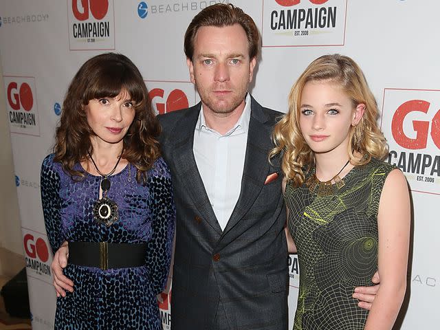 <p>Joe Scarnici/Getty</p> Eve Mavrakis, Ewan McGregor and Clara McGregor arrive at the 8th Annual GO Campaign Gala at Montage Beverly Hills on November 12, 2015.